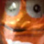 Close-up photo of an orange m&m easter egg wrapper